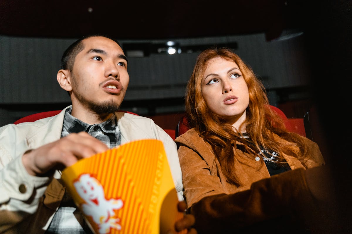Family enjoying a movie in the cinema