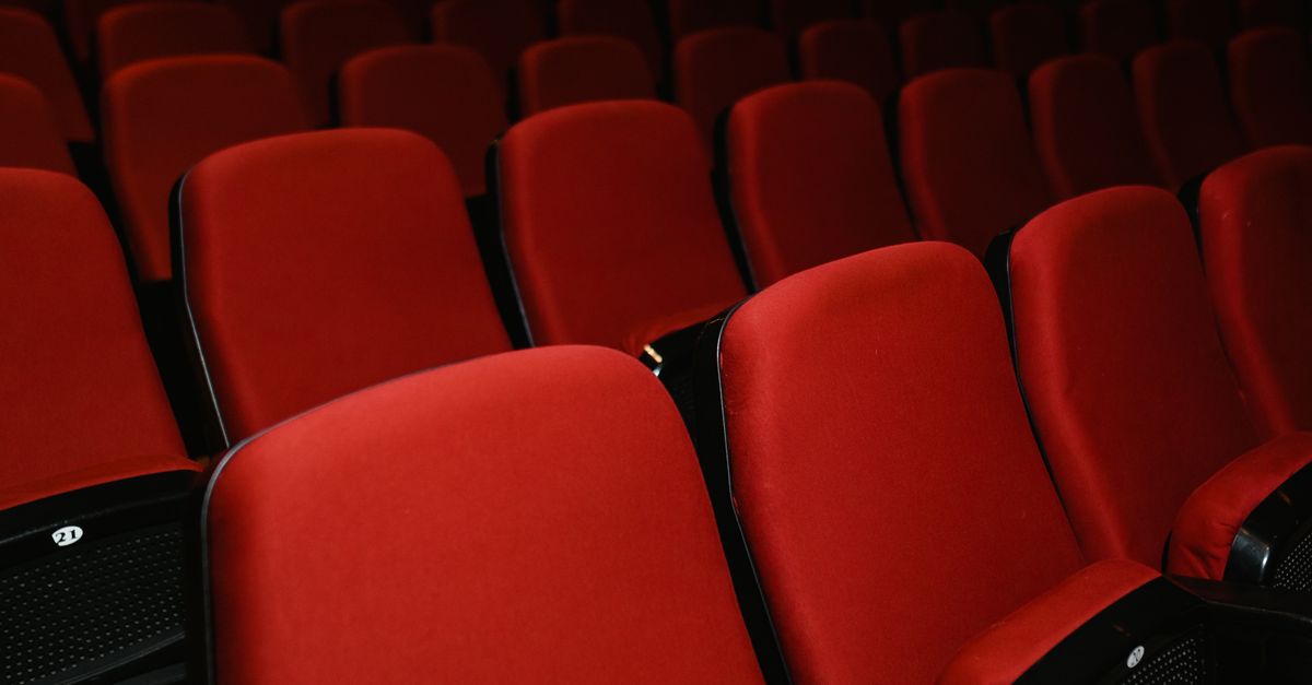 empty movie theater seats dramatic lighting