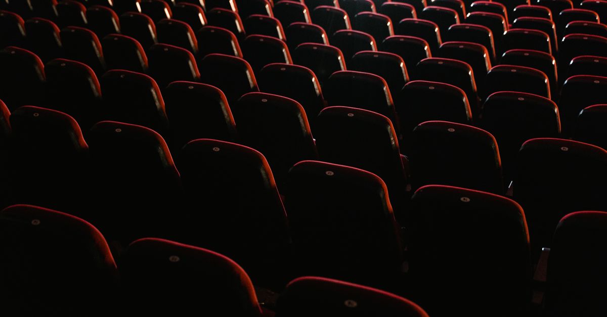 empty movie theater seats with cinematic lighting