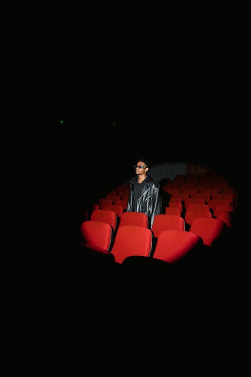 Free A Man Spotted in Auditorium Wearing Leather Jacket and 3D Glasses Stock Photo
