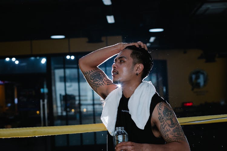 Latin American Man With Water In Gym