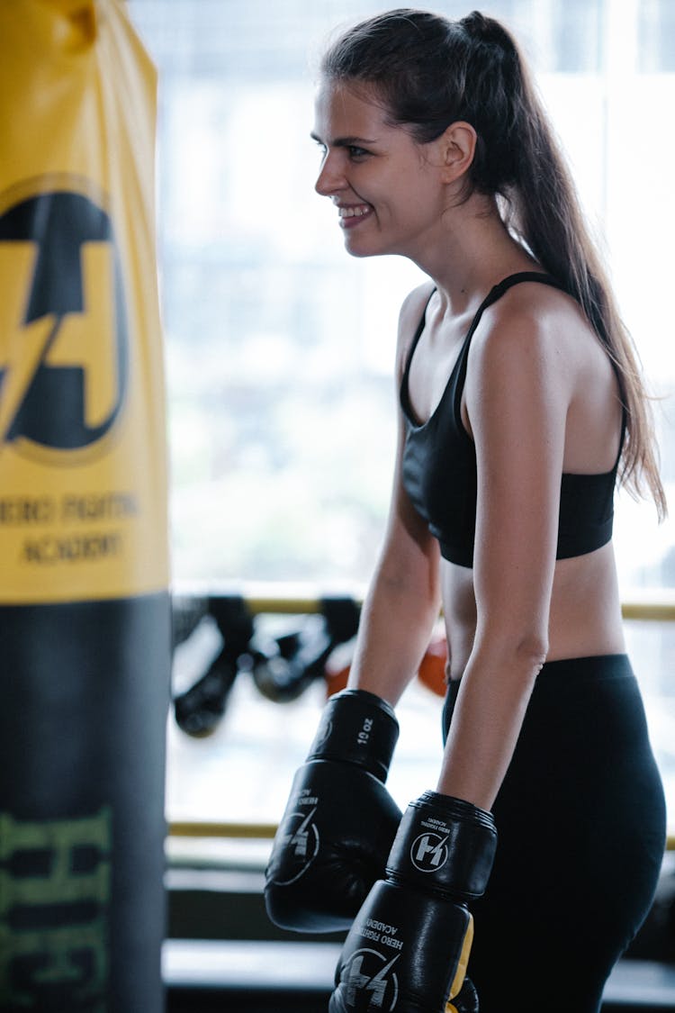 Positive Woman In Boxing Gloves