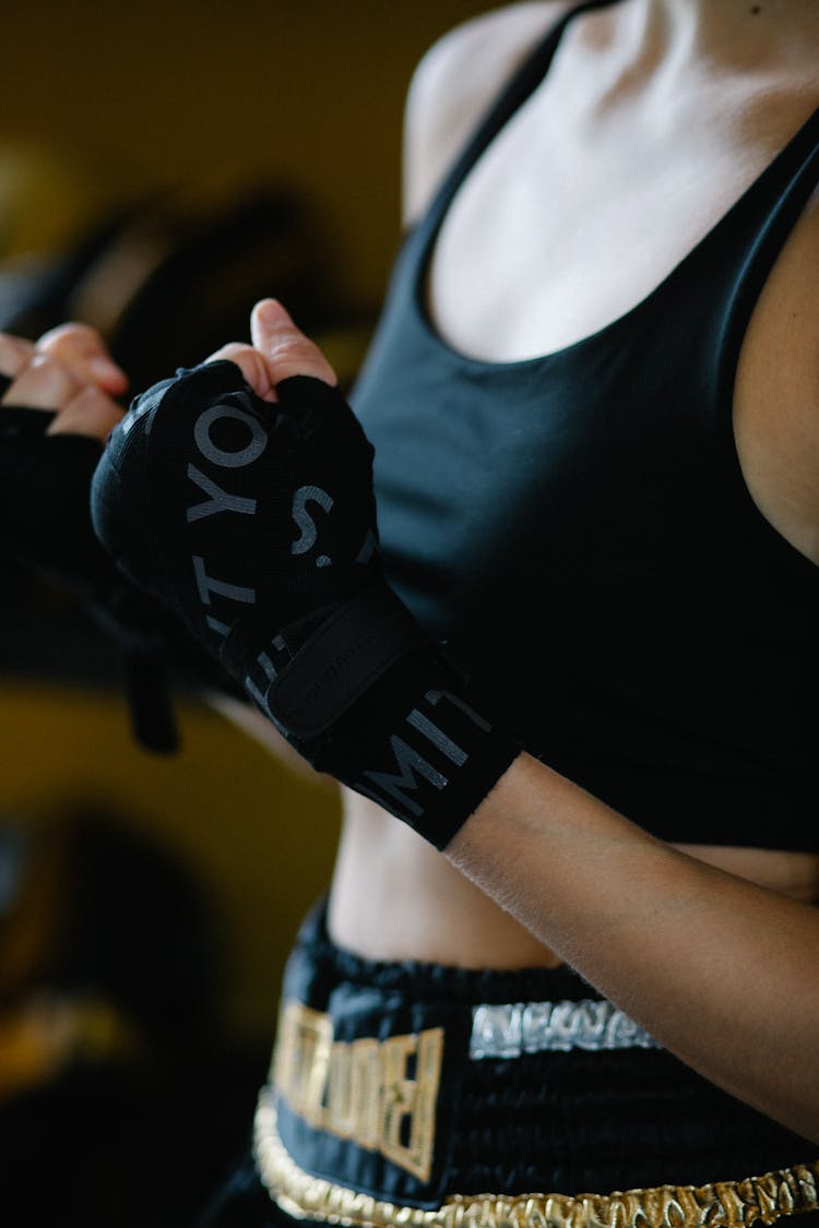 Crop Sportswoman With Bandages On Hands