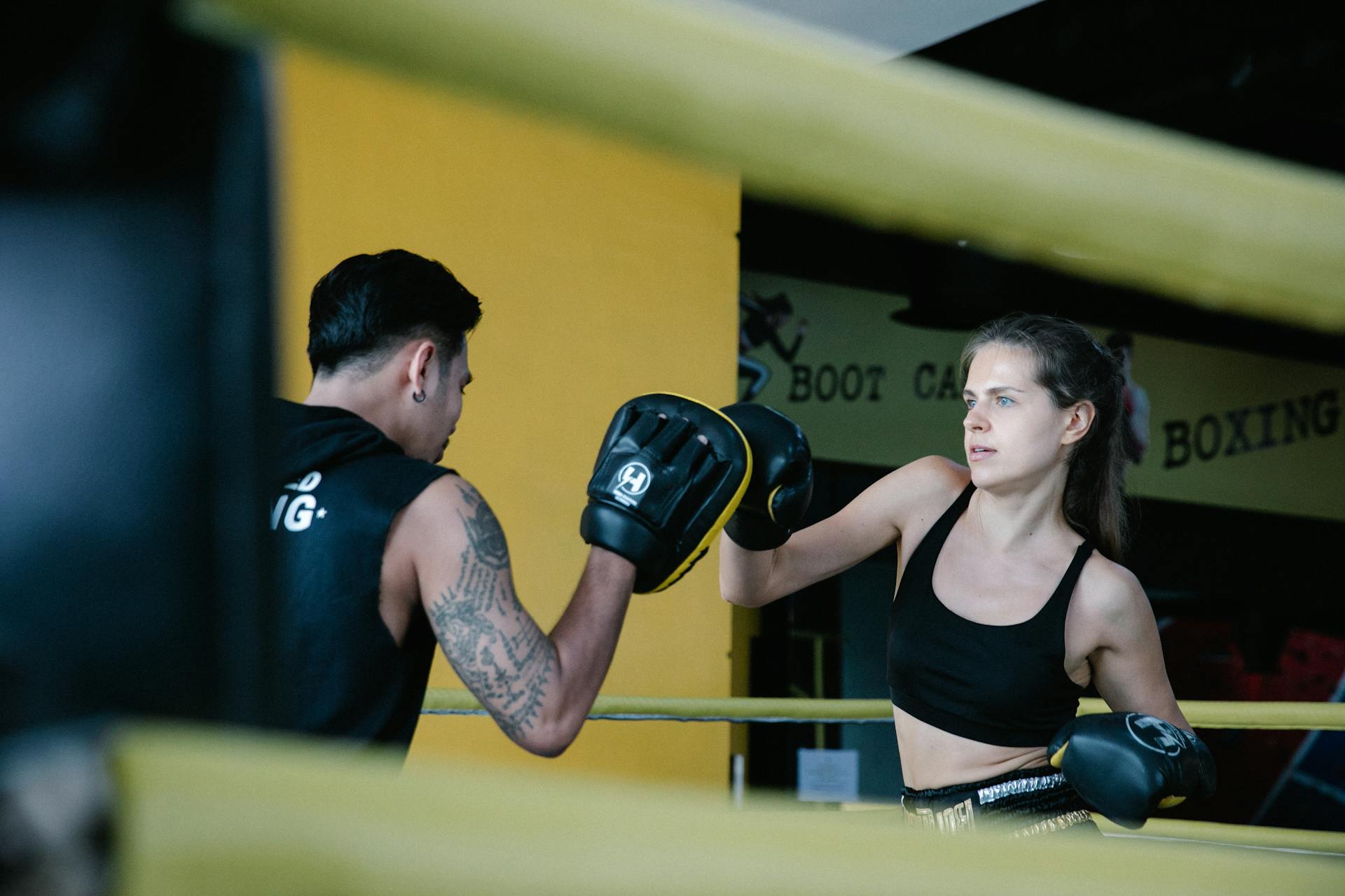 Woman Training in Boxing Ring