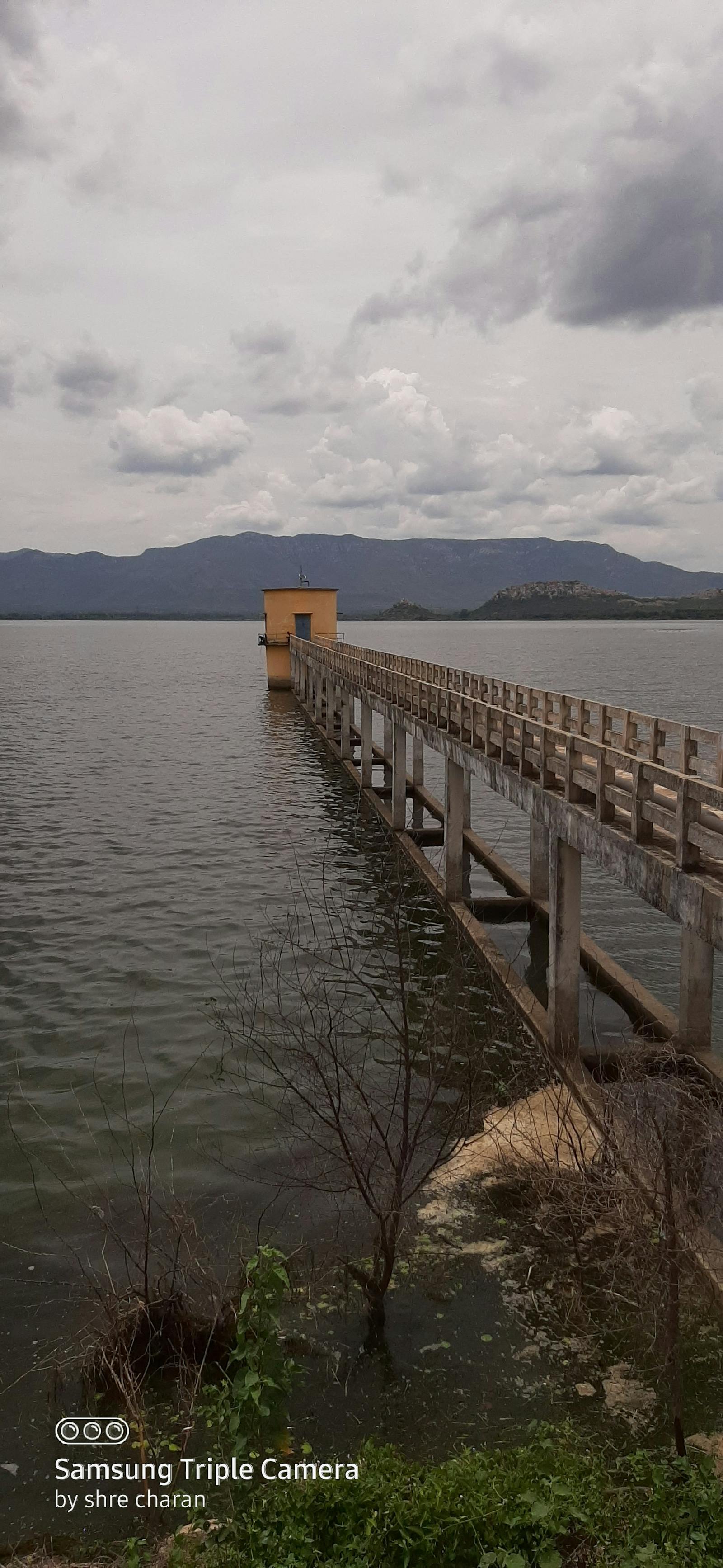 Live event crowd cheering with bright arena lights and stage setup