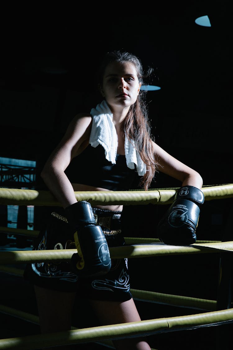 Female Athlete Standing On Boxing Ring