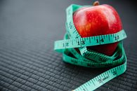 Red Apple on Green Tape Measure