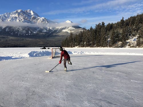 Free stock photo of ice capped mountains, ice hockey, outdoor ice hockey