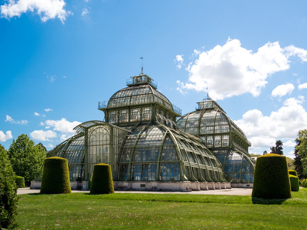 Person choosing water over soda in a refrigerator