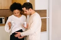 Man Touching the Belly of a Pregnant Woman