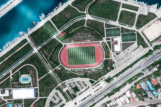 Aerial view of a sports complex with a stadium and fields in Istanbul, Turkey.