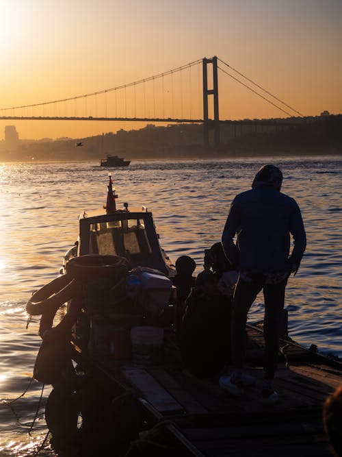 People riding a Boat on a River 