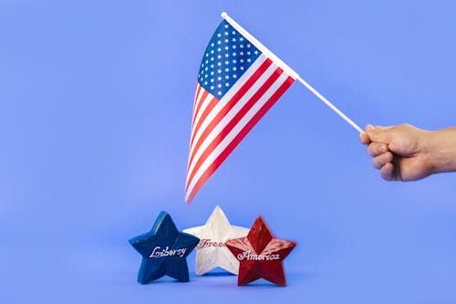 A Person Holding an American Flag