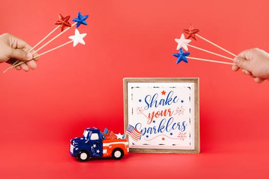 Patriotic 4th of July celebration with sparklers and American flag-themed decor.