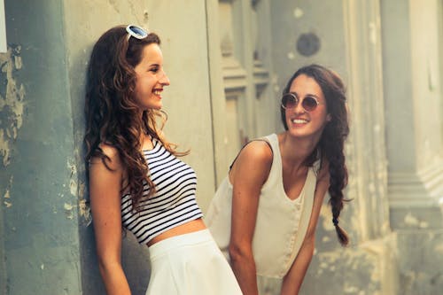 Free Two Women With White Sunglasses Stock Photo