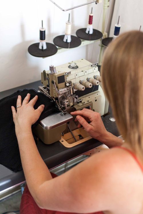 Person Using Stitching Machine A Person using a Sewing Machine · Free Stock Photo