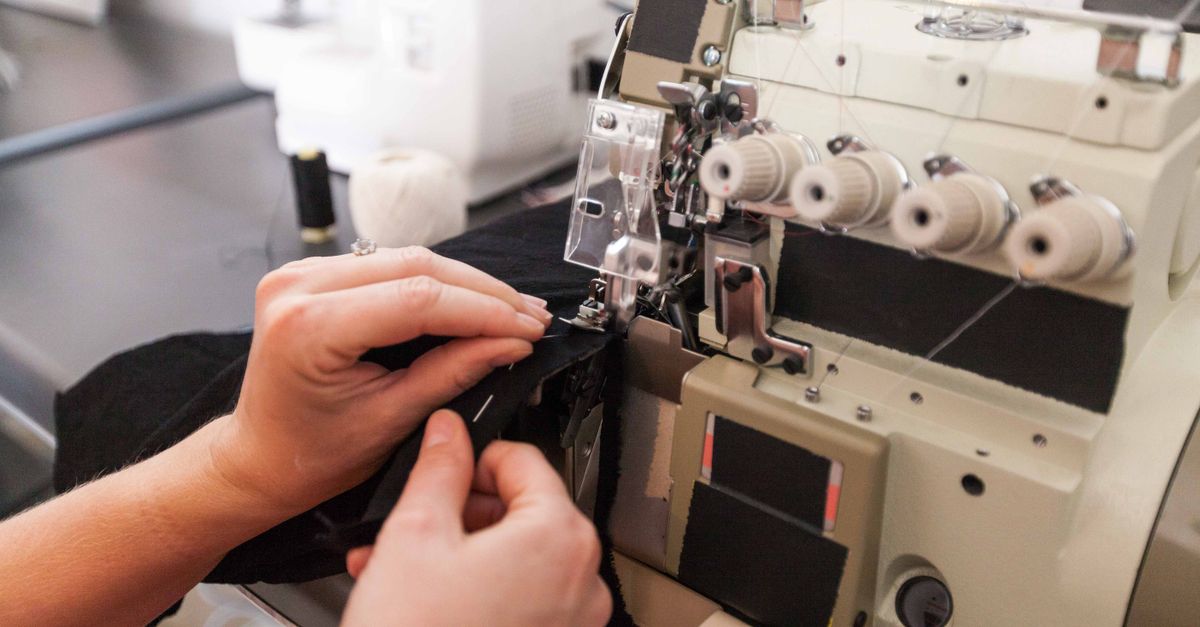 Close-up Photo of a Person Using a Sewing Machine · Free Stock Photo