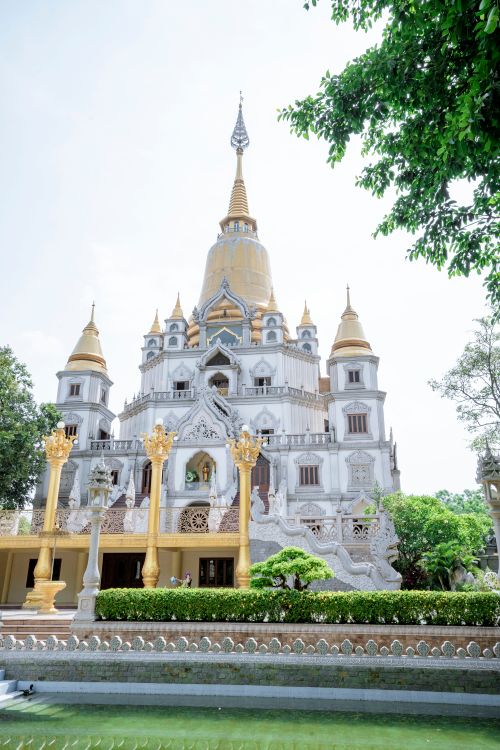 Free Discover the serene architecture of Buu Long Pagoda surrounded by lush greenery in Vietnam. Stock Photo