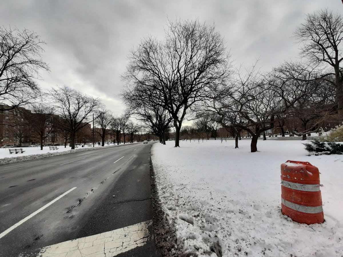Smartphone displaying a modern astrology app alongside a notebook