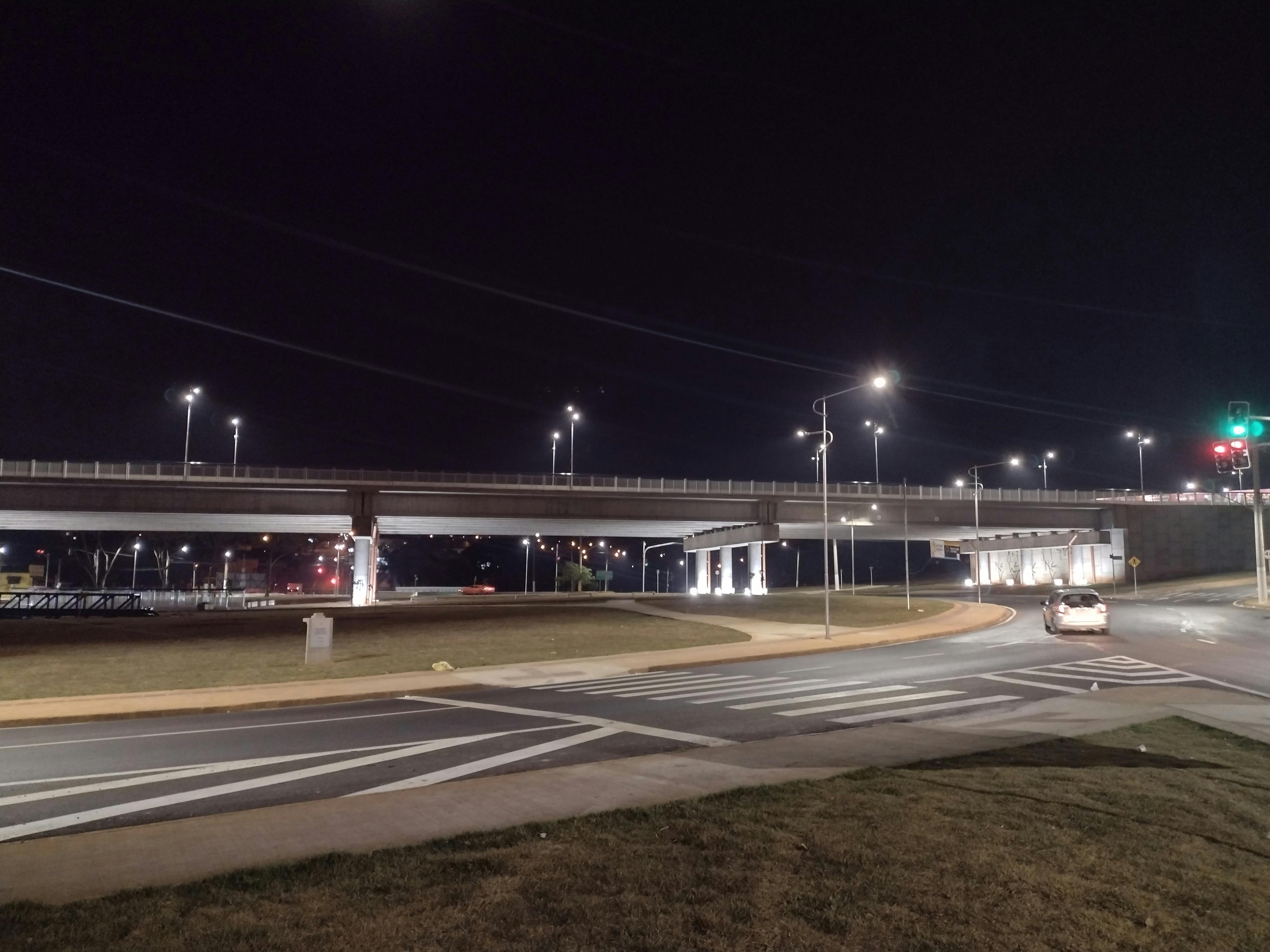 Cycling support staff reviewing race data on a tablet and laptop