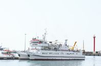 White Commuter Boat on Body of Water