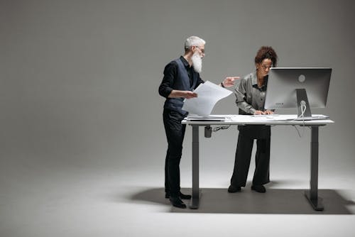 Studio Shoot of People Collaborating on a Project