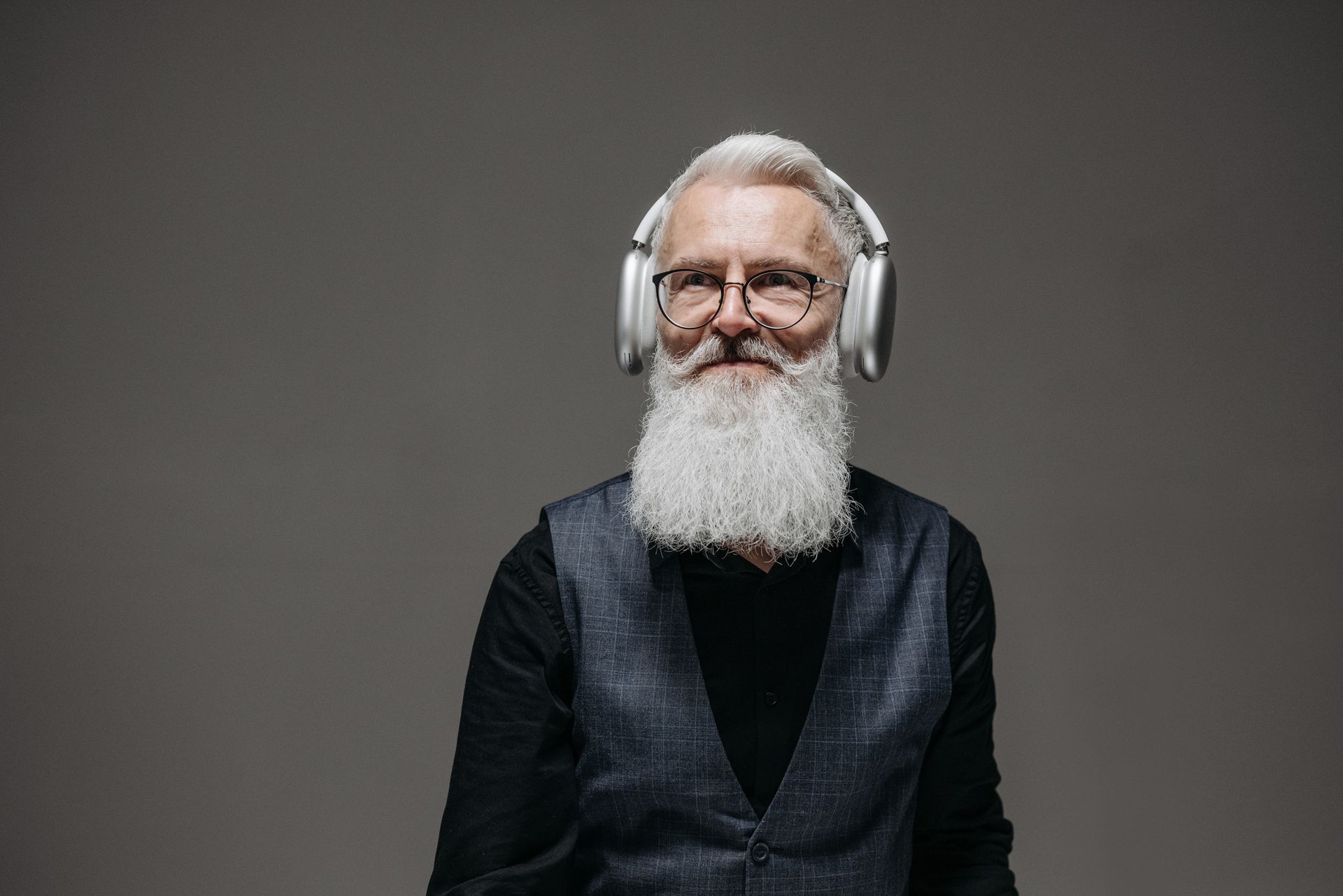 A Businessman Wearing Wireless Headphones