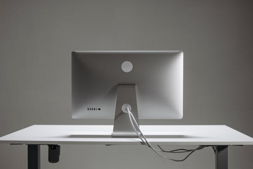 Silver Apple Mac Mini on White Table