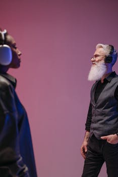 Portrait of diverse individuals enjoying music with headphones in a studio setting.