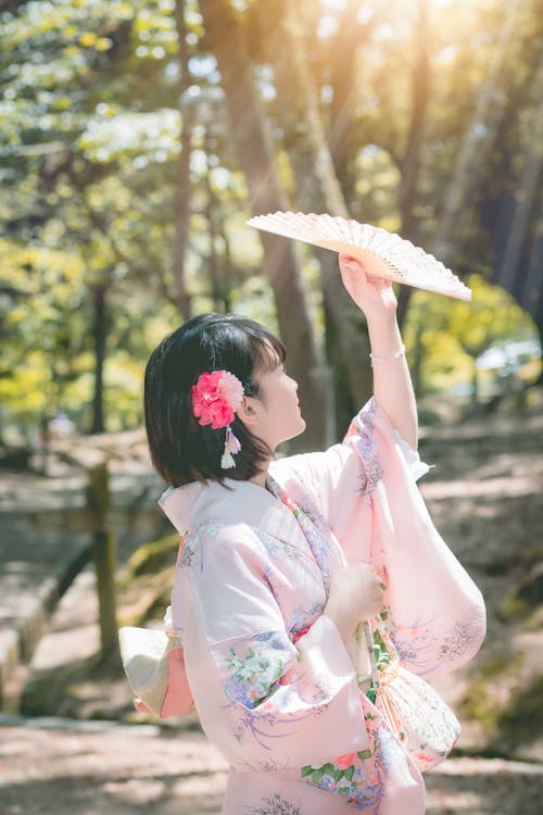 Woman Wearing Kimono Holding Fan · Free Stock Photo
