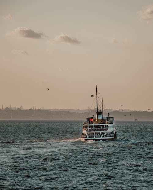 Photos gratuites de bateau, coucher de soleil, dinde