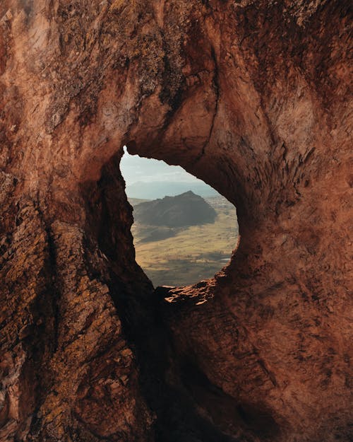 Free Rock Formation with a Hole in the Middle Stock Photo