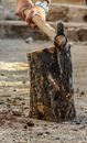 Photography of a Person Chopping Wood