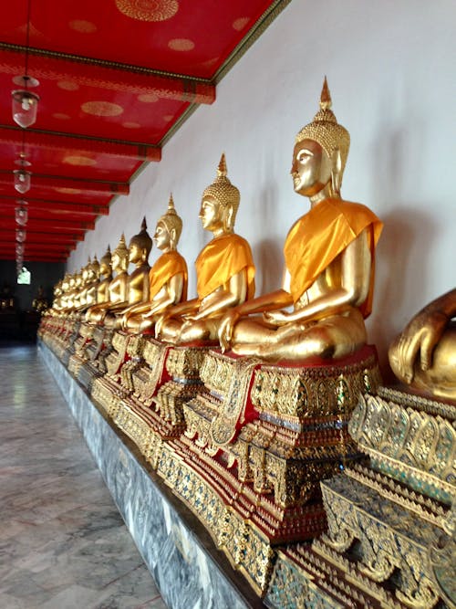 Statues of Buddha in a Row