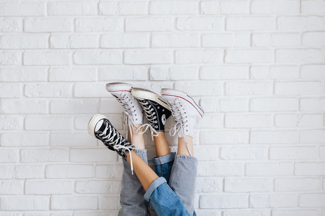 Photo of People Wearing Converse All Star Sneakers · Free Stock Photo