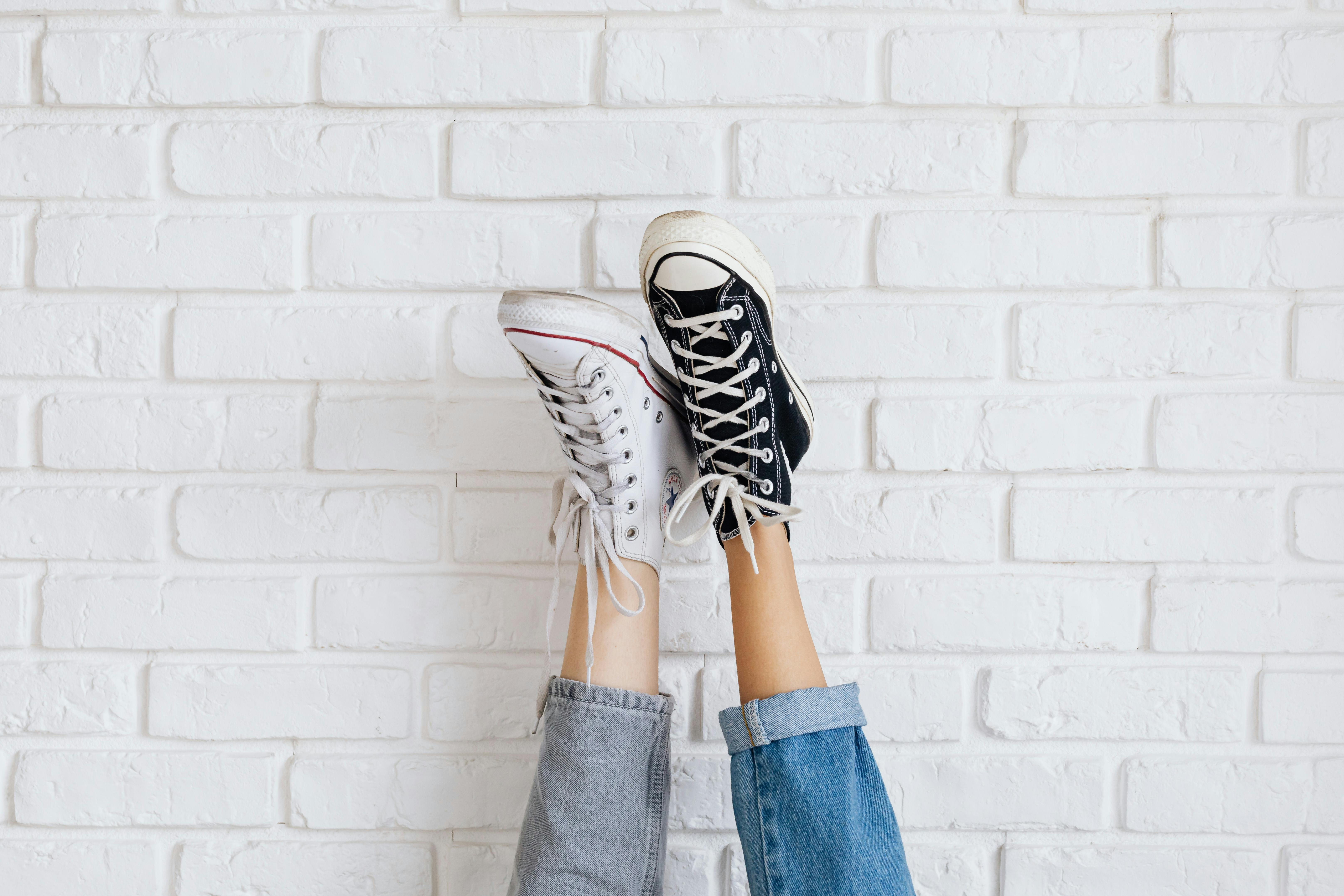 Black and White Converse All Star Low Top Sneakers · Free Stock Photo