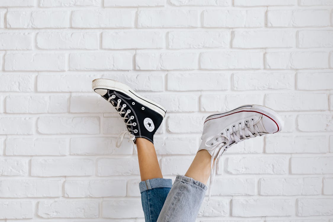 Women Wearing Converse All Stars in Contrast Color · Free Stock Photo