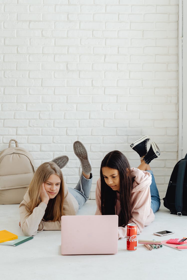 Young Girls Using A Laptop