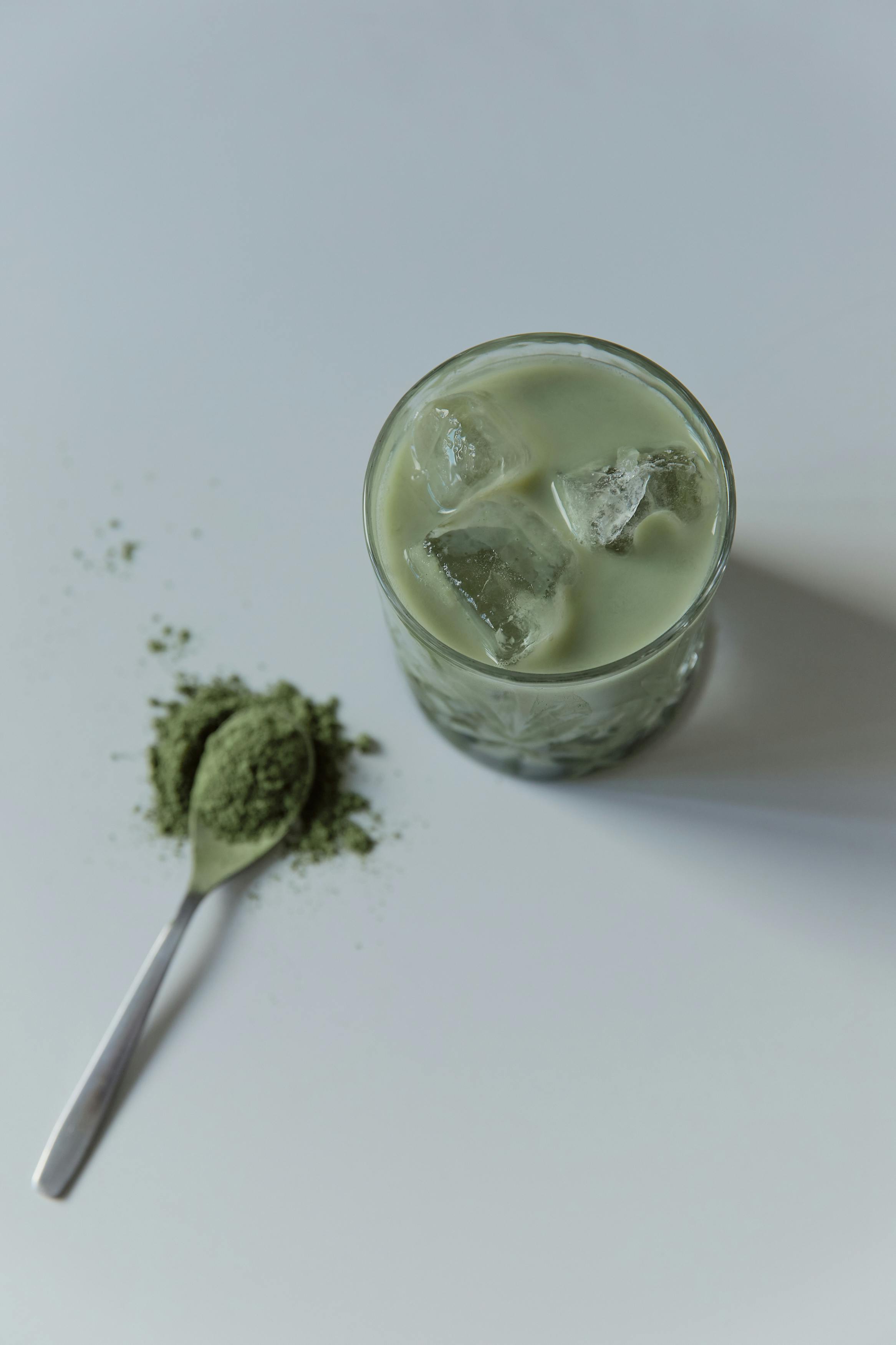 organic grass powder and a cold drink with ice