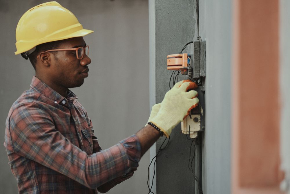 Home service professional working with equipment