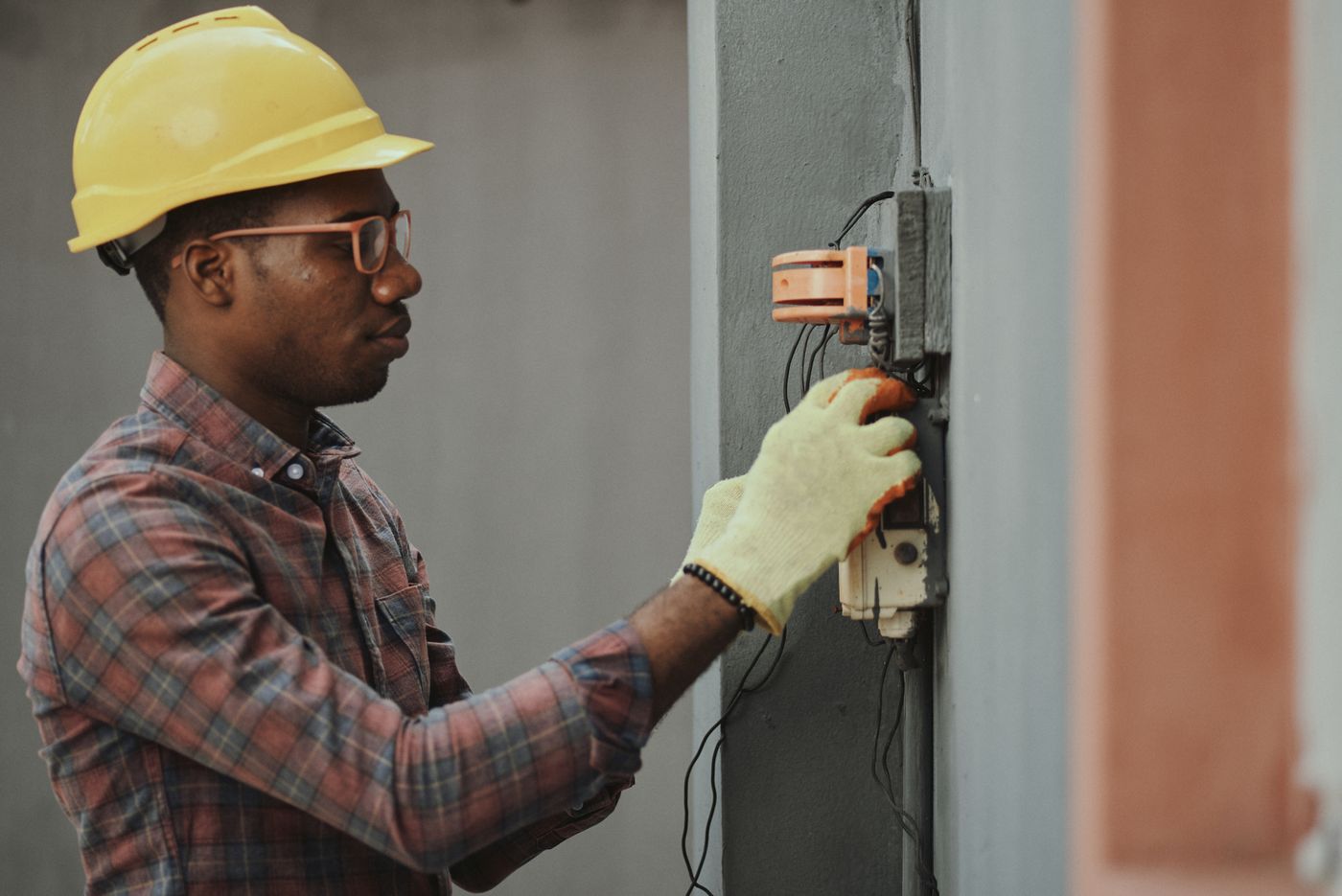 Home service professional working indoors with tools