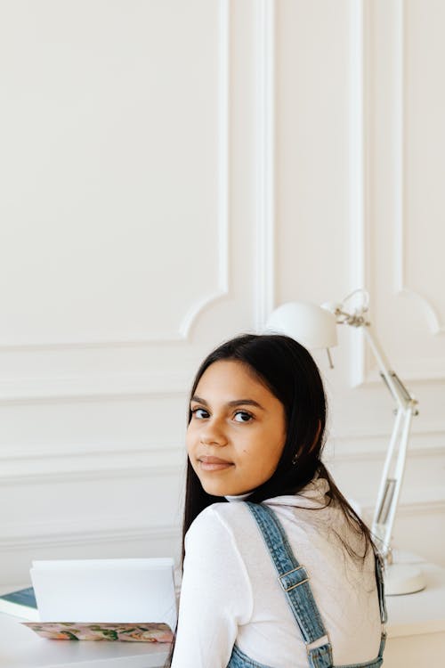 A Girl Looking Back at the Camera