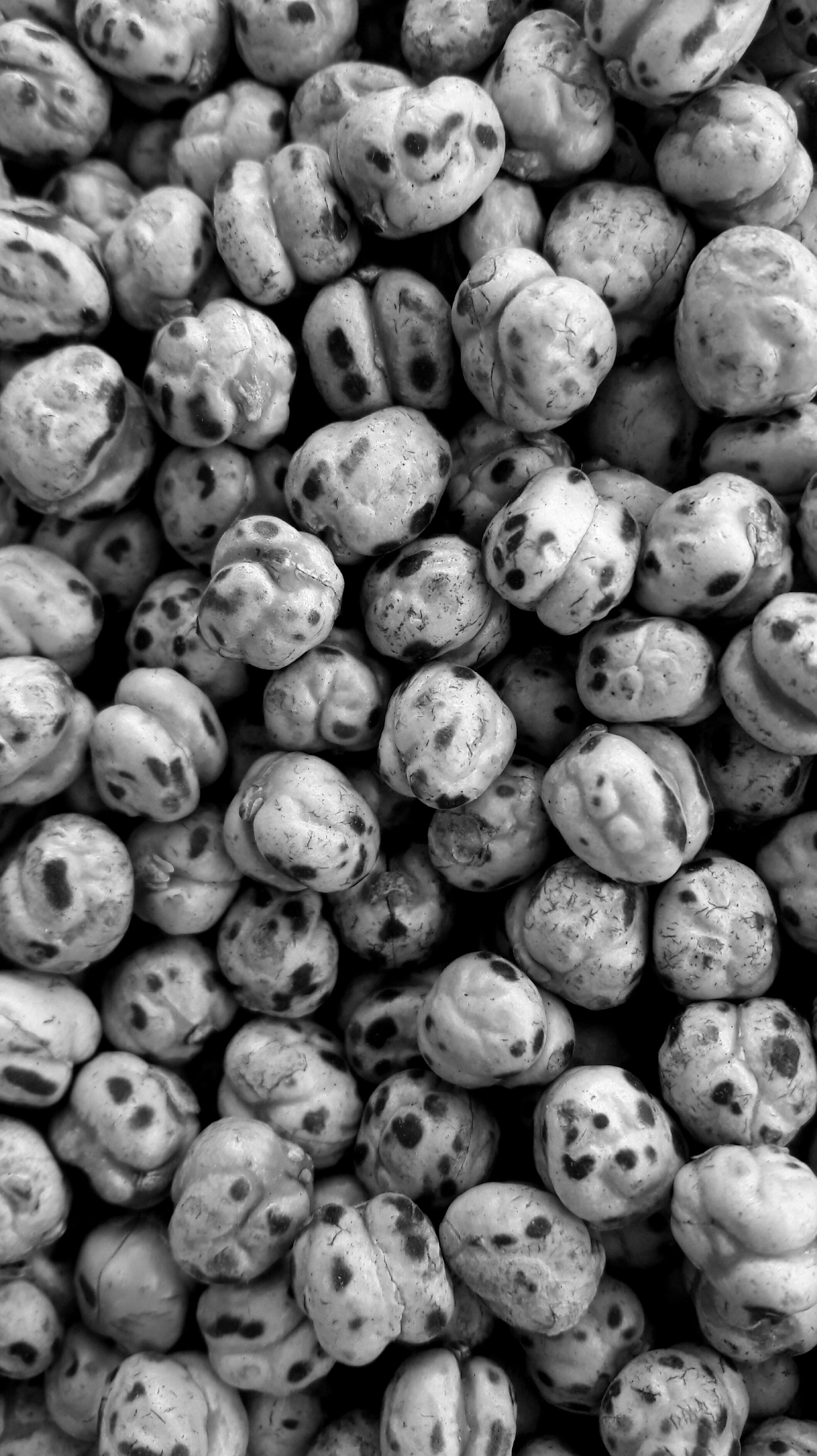 Free stock photo of abstract, black and white, roasted chickpeas