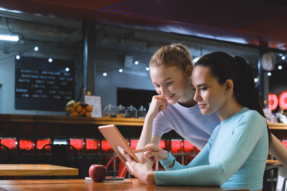Women using a Tablet · Free Stock Photo