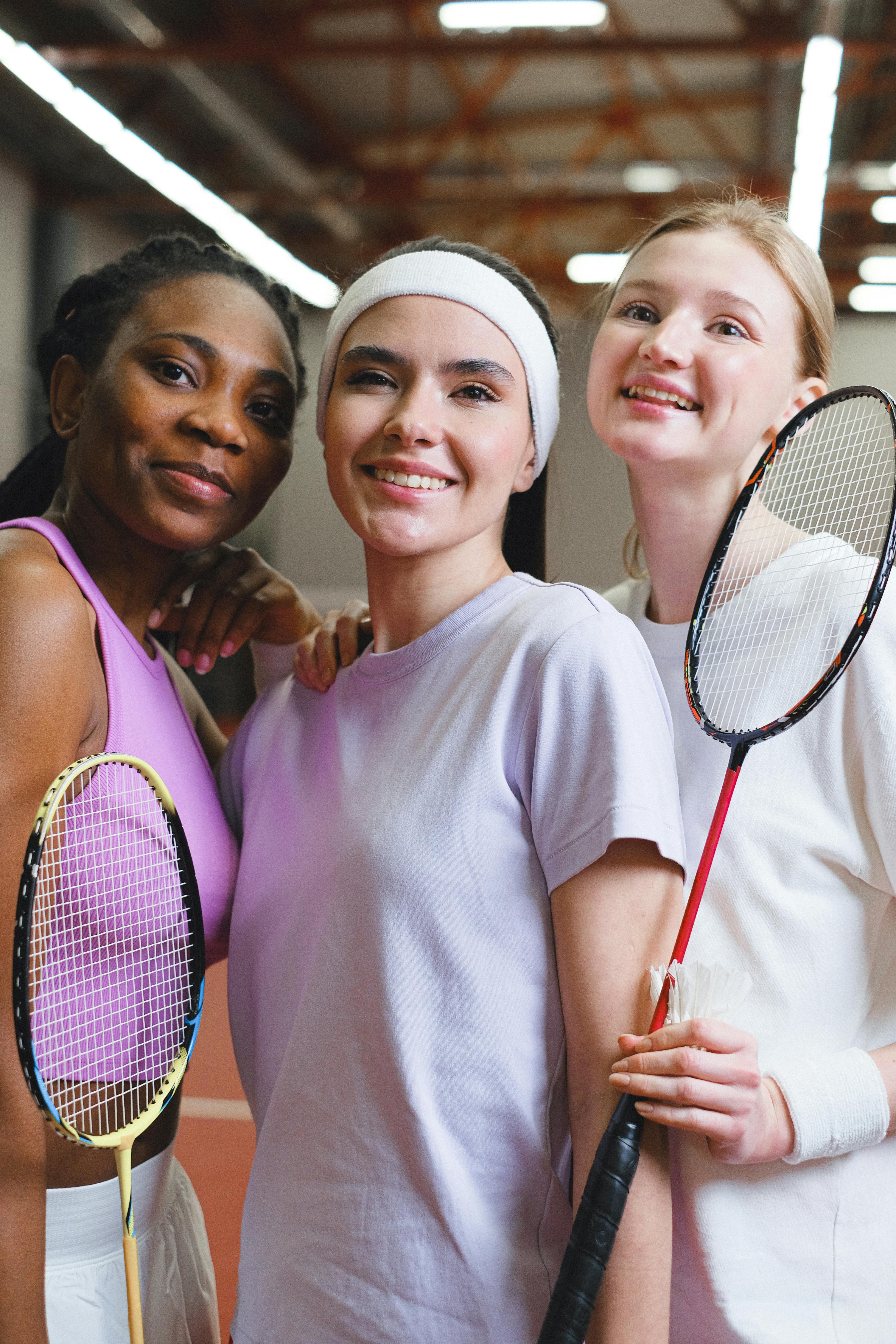 Women Holding Badminton Rackets · Free Stock Photo