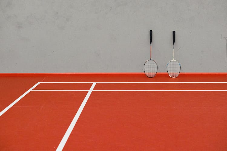 Badminton Racquets On Court