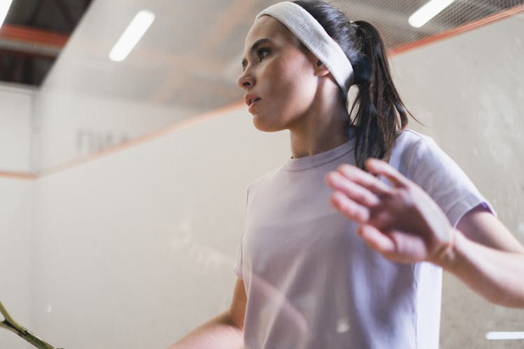 A Woman Wearing A Sweatband