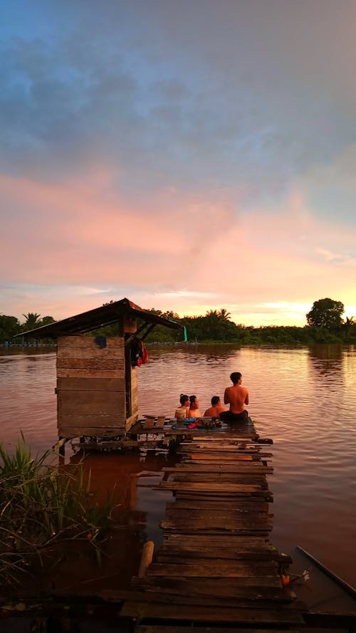 Photos gratuites de ciel nuageux, crépuscule, gens