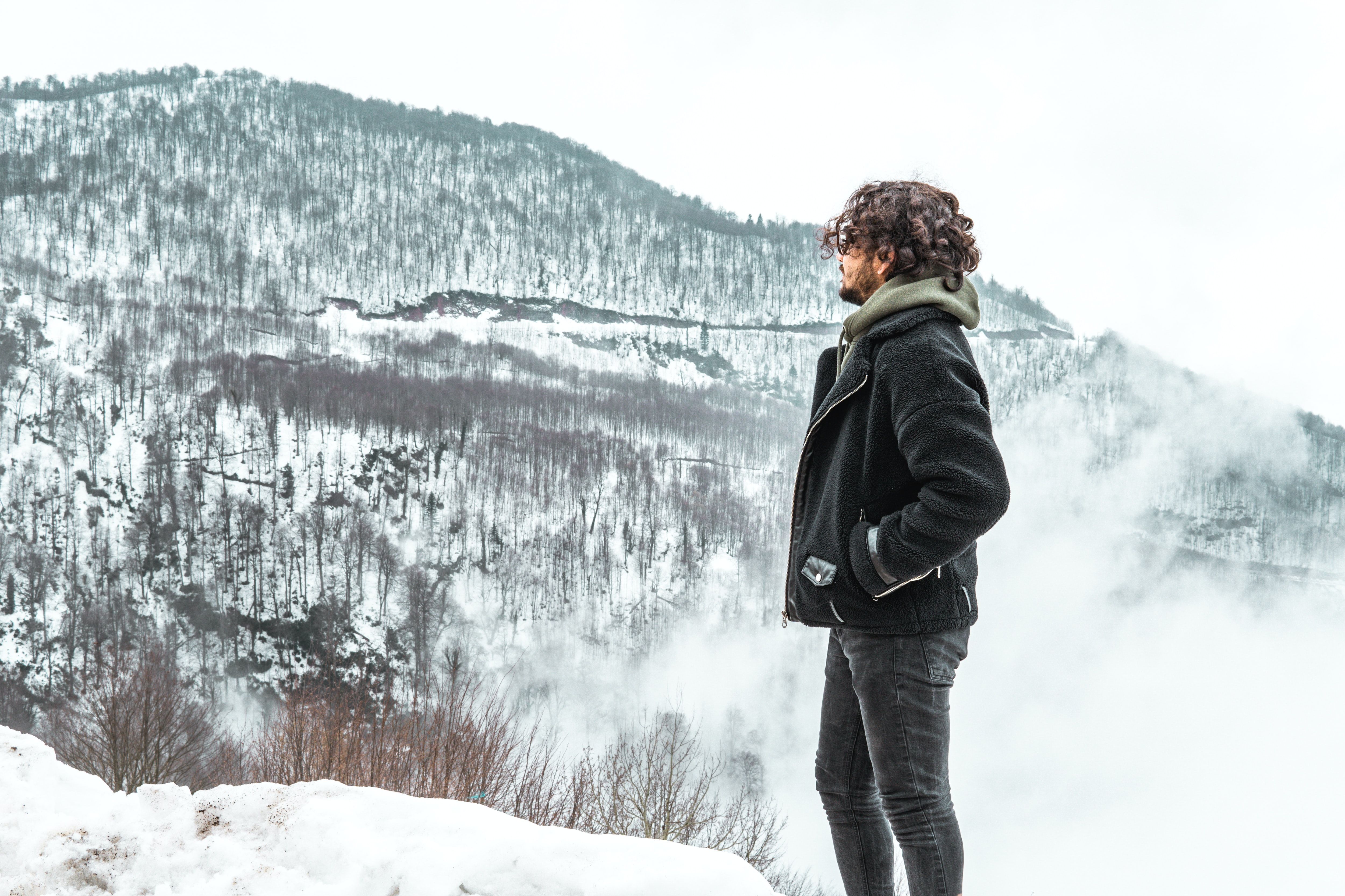 Layered jacket worn on a cold mountain morning