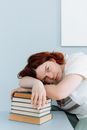 Woman in White Shirt Lying on Bed